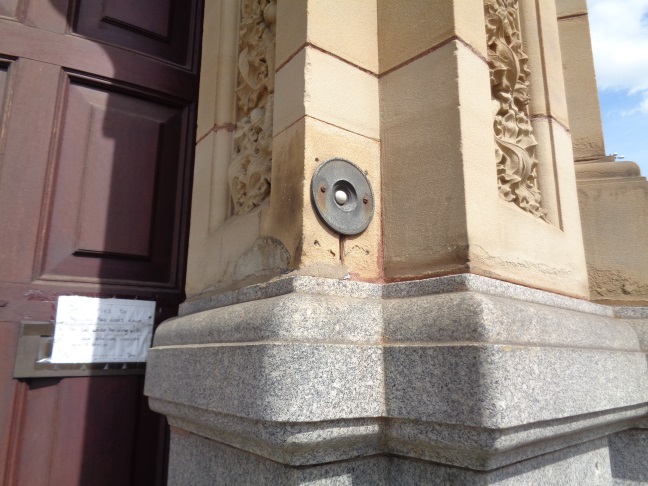 Close-up of the old door bell push button on the old Midland Bank at the junction of Meanwood Road and North Street, Leeds (taken May 5 2016).