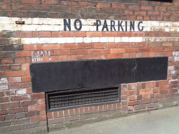 Close-up of the 'Please ring for attention' wording on the Templar Lane side of the old British Road Services building (taken June 9 2016).