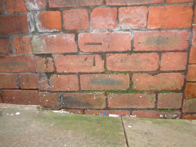 The Bench Mark in the Angel Inn Yard passageway just off Briggate, Leeds (taken June 30 2016).