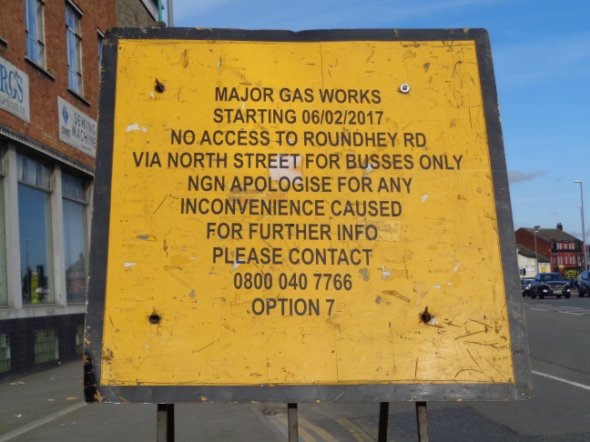 GasWorksWarningSignRegentStreetLeedsMar072017.RoundheyShouldBeRoundhayAndBussesShouldBeBuses..jpg